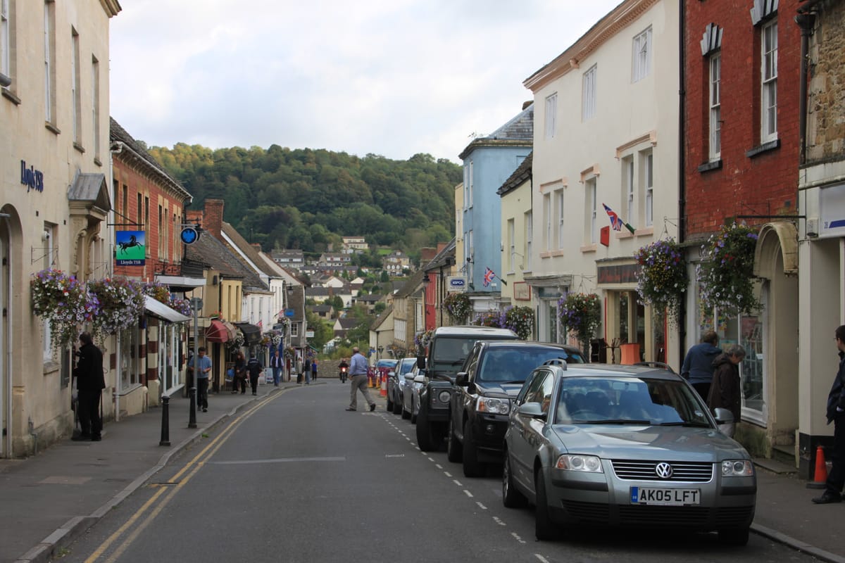The high street at Wotton-under-Edge beneath the Cotswold escarpment
